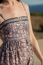 Made by Mortals women’s Jardin de Rose Midi Dress, bohemian strappy dress in black with white, blue, and pink floral, hand block printed cotton.